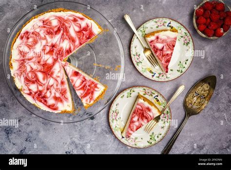 Raspberry Swirl Cheesecake Stock Photo - Alamy