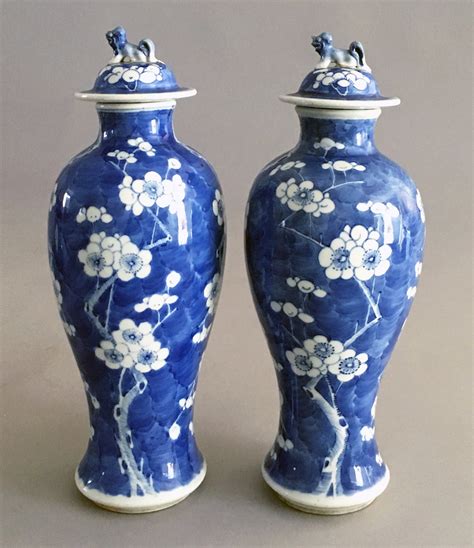 Pair Chinese Blue & White Prunus Pattern Vases & Lids