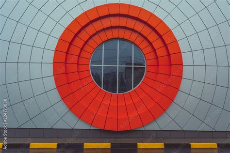 Round window made in an unusual style, modern architecture Stock Photo | Adobe Stock