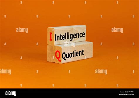 IQ intelligence quotient symbol. Concept words IQ intelligence quotient on wooden blocks on a ...