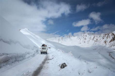 LADAKH, INDIA - Pictures of Winter - January 24, 2018: A road leading to the town of Leh ...