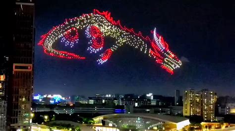 This timelapse records a dragon made of drones gliding across the sky ...