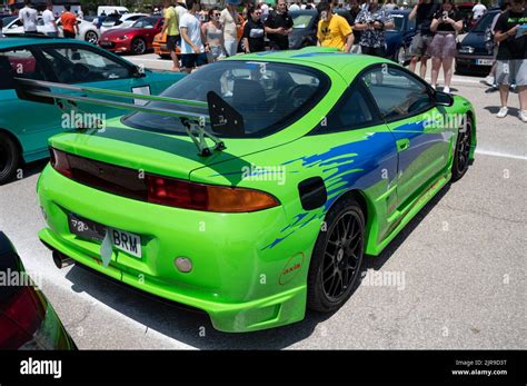 A second-generation green Mitsubishi Eclipse, tuned in style of Brian O'Conner from Fast and ...