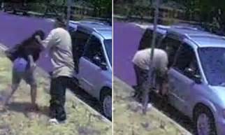 Kidnapping caught on video as man forces woman into van | Daily Mail Online