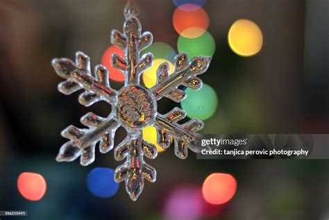 Snowflake In Christmas Lights High-Res Stock Photo - Getty Images