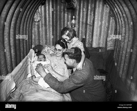 Family inside Air Raid Shelter during WW2 Stock Photo - Alamy