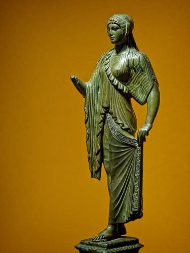 Roman figurine of a woman dressed in a tunic with a Maeand… | Flickr