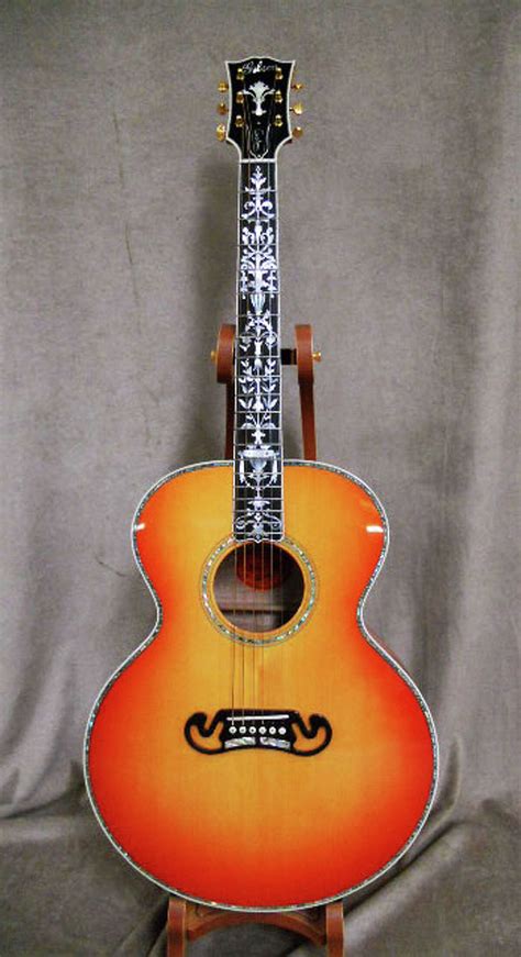 Michael Brown's collectible guitars bring in more than $100,000 at auction