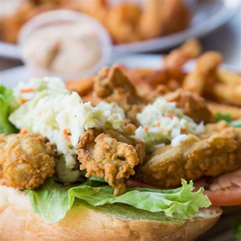 Fried Oyster Po-Boy Sandwich Topped with Cole Slaw | ocean vista resort