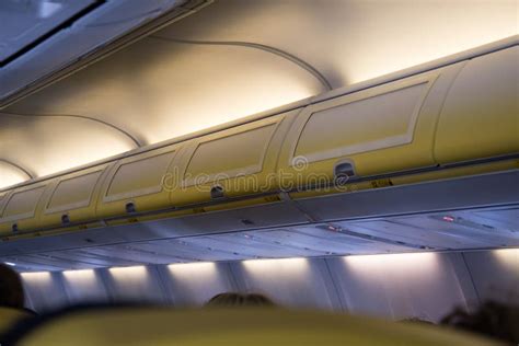 Aeroplane Interior Overhead Luggage Area and Compartments Stock Photo ...