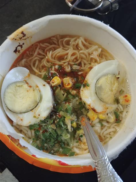 Bowl microwave ramen noodles with 2 halves of a hard boiled egg on top : r/shittyfoodporn