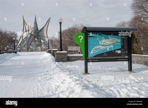 Montreal, CA - 5 February 2017: Parc Jean Drapeau map with Calder sculpture "Man" in the ...