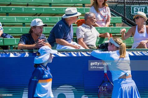 Donna Vekic chatting with her coach Nick Horvat while her opponent ...