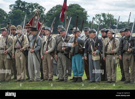 Confederate Soldiers on the battlefield of a American Civil war reenactment at Spetchley Park ...