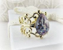 Popular items for harlequin opal ring on Etsy