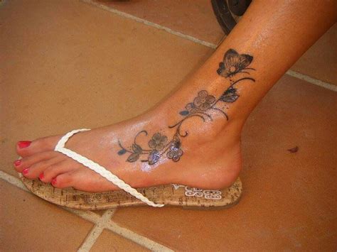 Foot tattoo | Vine foot tattoos, Foot tattoos for women, Butterfly foot ...