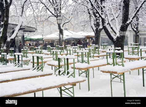 Germany Bavaria Munich Viktualienmarkt beer-tables snow-covered waiter-Bavaria sight trees beer ...