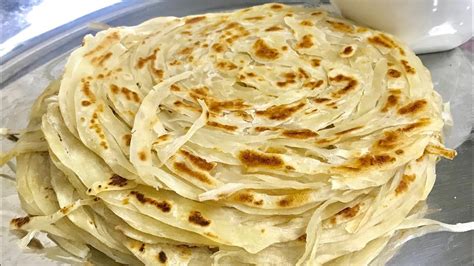 Flaky layered paratha recipe | Kerala parotta recipe - YouTube | Paratha recipes, Paratha, Recipes