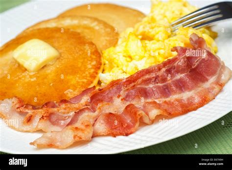 Eggs Bacon and Pancakes, Scrambled Eggs and Pancake Breakfast Stock Photo - Alamy