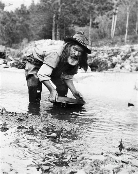 Prospector Panning For Gold by Bettmann