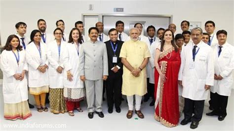 Narendra Modi poses with the Doctors and staff of HN Reliance ...