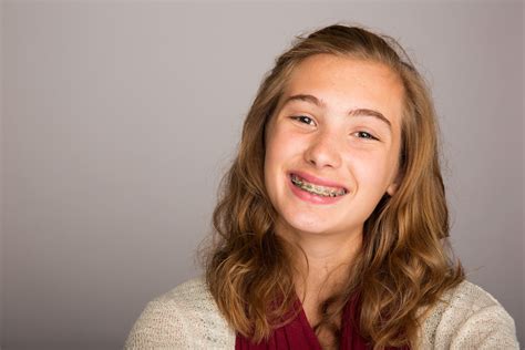 preteen girl with braces - Cosmetic and Family Dentistry Blog