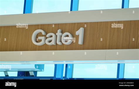 Airport gate sign terminal number one fly entrance Stock Photo - Alamy