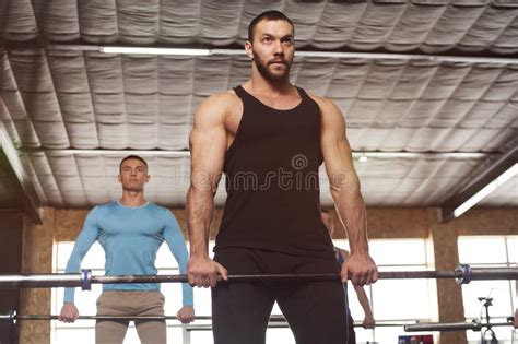 Portrait of Young Strong Man Training with Barbell Stock Image - Image ...