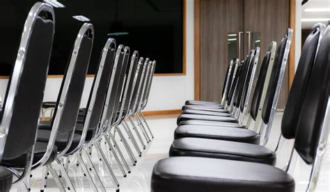 Row of black chairs 14537563 Stock Photo at Vecteezy