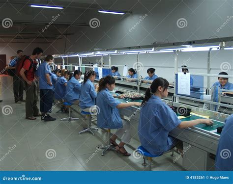 Chinese sweatshop interior editorial photo. Image of electronic - 4185261