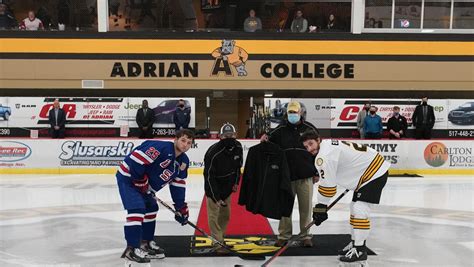 Adrian College honors Komon: Bulldogs dedicate scorekeeper box prior to exhibition game