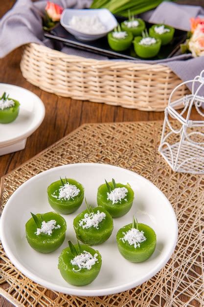 Premium Photo | Kue lumpang pandan or kue ijo kue ijo is a traditional green cake and is small ...