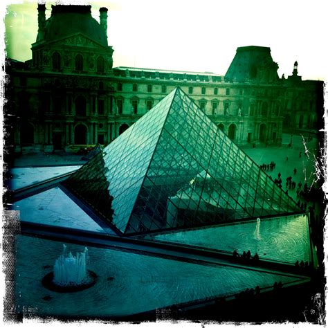 The Louvre Museum Pyramid, Paris. I cooled my blistered feet in the fountains near the pyramid ...