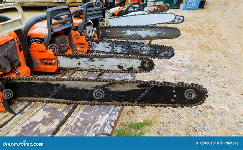 Chainsaw - Professional Petrol Chain Saw Stock Photo - Image of chain ...