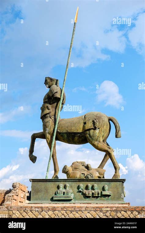 Pompeii ruins, Centauro bronze statue by Igor Mitoraj, Pompeii forum ...