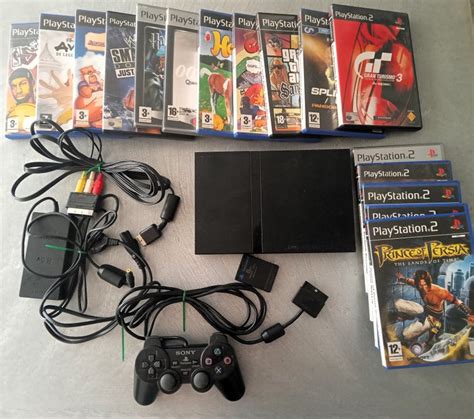 1 Sony Playstation 2 (PS2) - Console with games (16) - - Catawiki