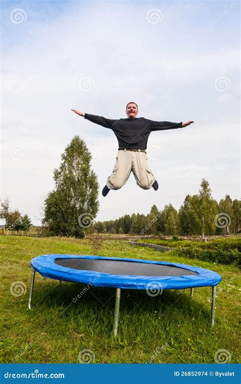 Man Jumping On The Trampoline Stock Images - Image: 26852974