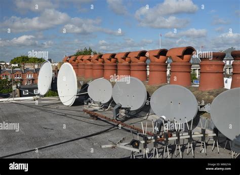 Satellite TV dish Stock Photo - Alamy