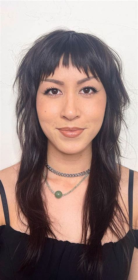 Shag Haircuts That're Low-Maintenance Yet Stylish Haircut : Beachy Shag with Bangs