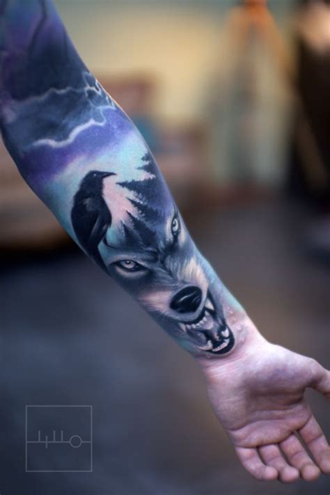 Modern style colored sleeve tattoo of evil wolf with crow - Tattooimages.biz