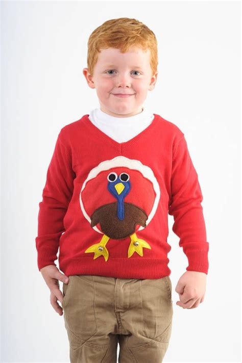 Red children's Christmas jumper with turkey design