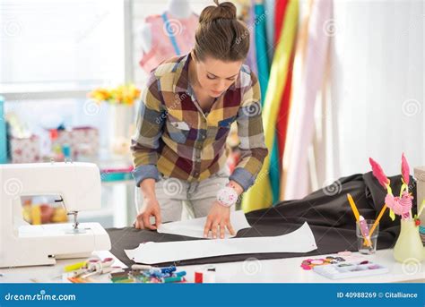 Seamstress Making Pattern on Fabric Stock Image - Image of modiste, needle: 40988269