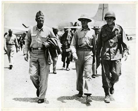 U.S. Commanders Nimitz, Spruance, and Buckner inspecting Okinawa Airfield in Okinawa, Japan ...