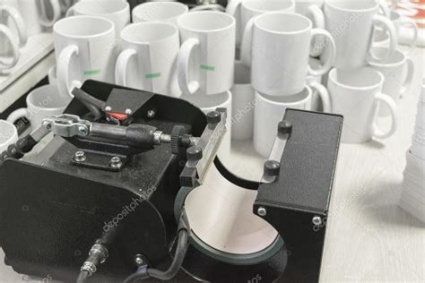 Sublimation printing equipment and mugs — Stock Photo © Mixa75 #112197698