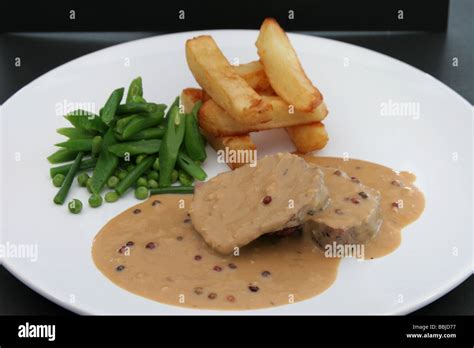 rump steak and armagnac and pink peppercorn sauce Stock Photo - Alamy