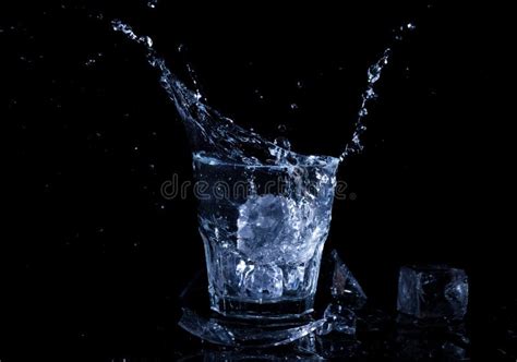 Water Splash in a Glass. a Glass of Cold Water Stock Photo - Image of celebration, modern: 88564998