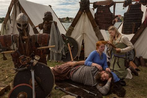 Viking Reenactors Stage Battles and Sail Ships