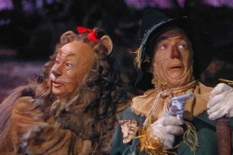 Why does the Scarecrow in Wizard Of Oz have a gun?