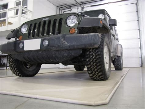 Keep it clean with parking mats - News | Garage Frontiers | Edmonton Alberta