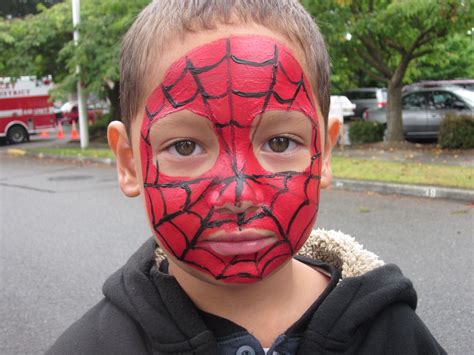 Spiderman face paint | Face painting designs, Spiderman face, Face painting